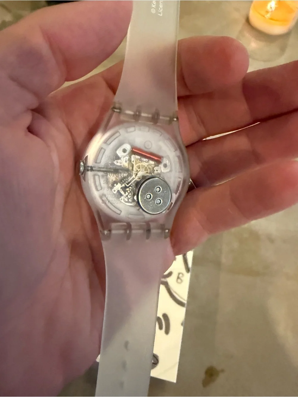Swatch Translucent Strap Watch with White Patterned Dial